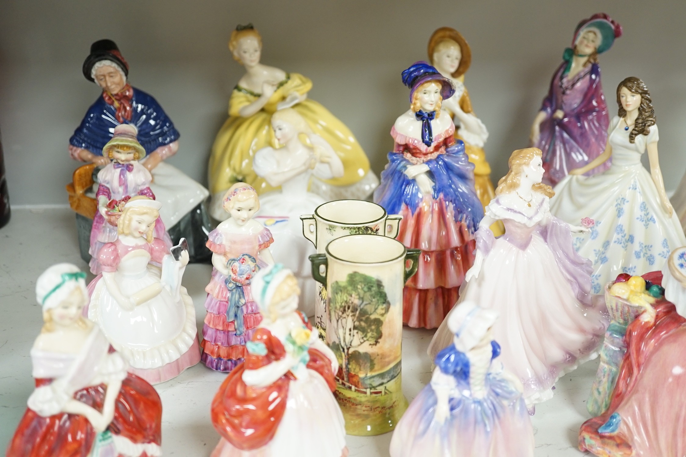 A quantity of Royal Doulton figures, to include Peggy, Valerie, Dinky Do, Penelope, Cissie, and others. Approx. Twenty-four